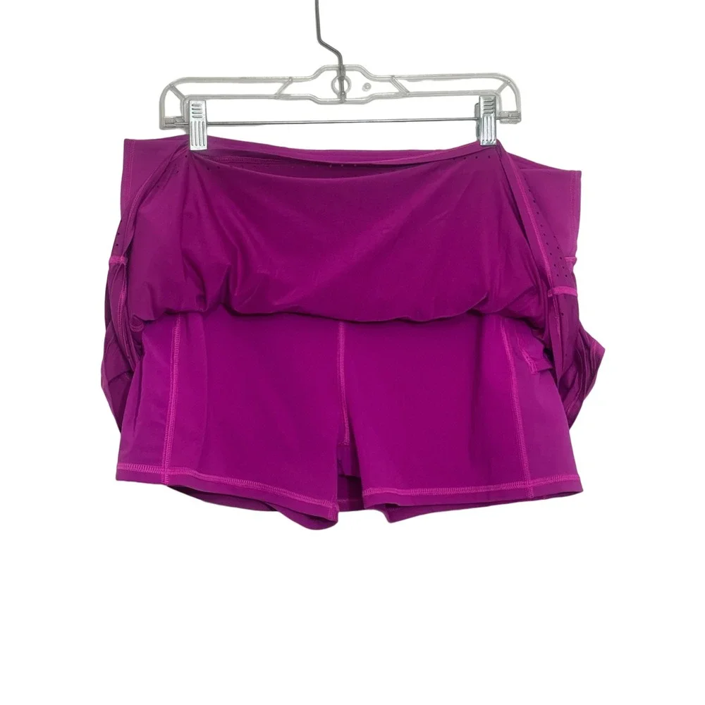 Athleta XL Fuschia Skort Pockets (two small‎ snags) See images